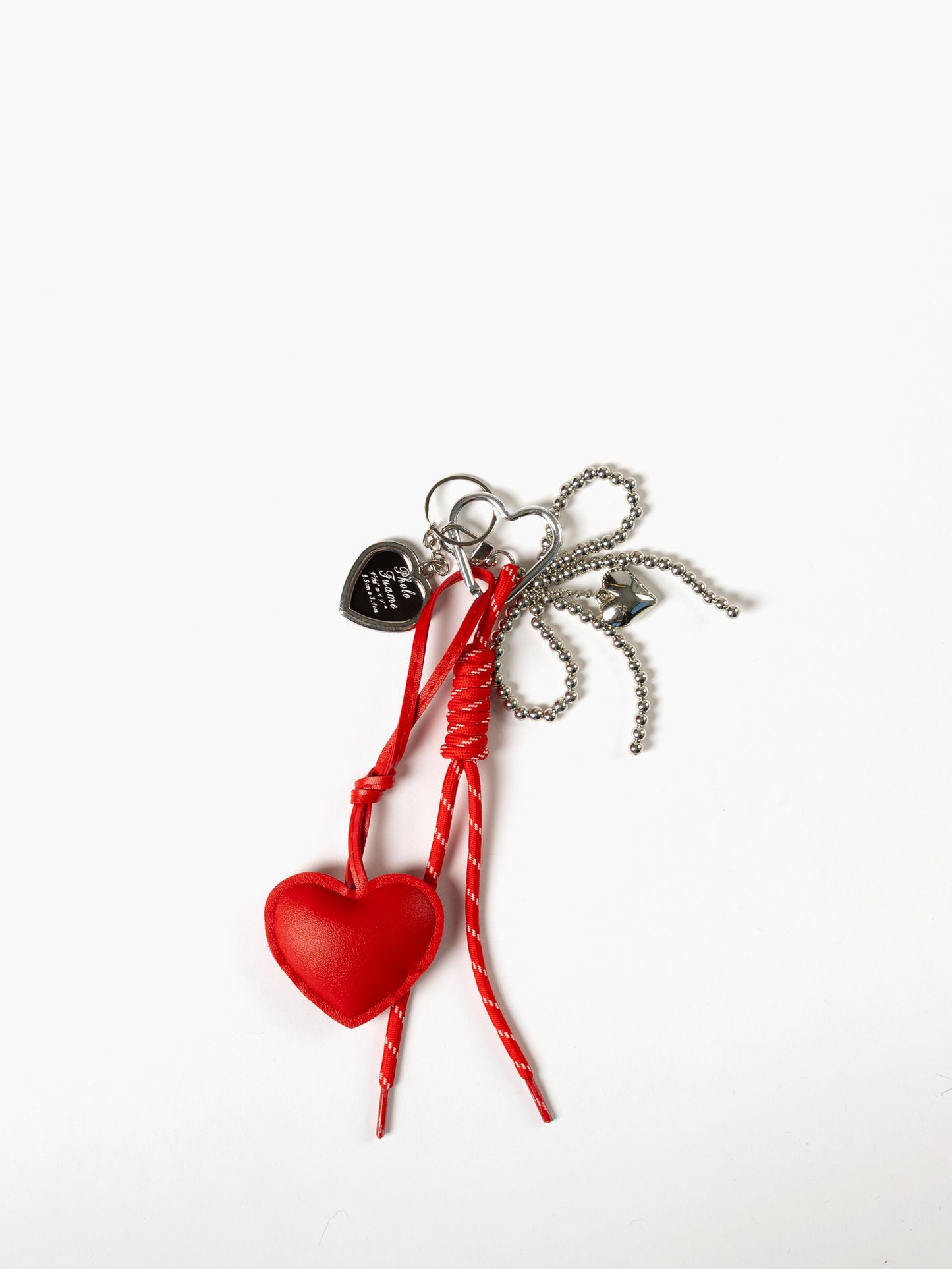 
                  
                    Lyla & Luxe - Cluster Heart Charm
                  
                