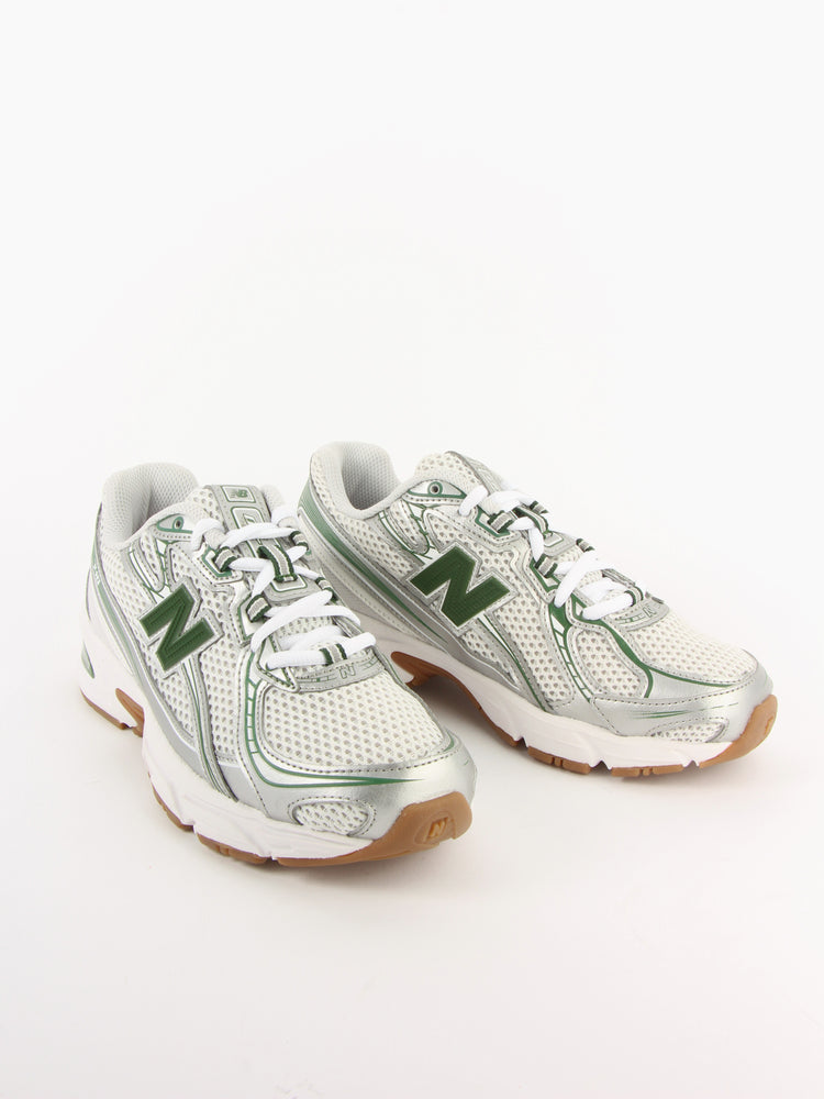 
                  
                    New Balance - 740
                  
                