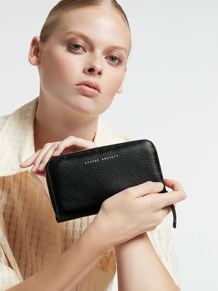 
                  
                    Status Anxiety - Yet to Come
                  
                